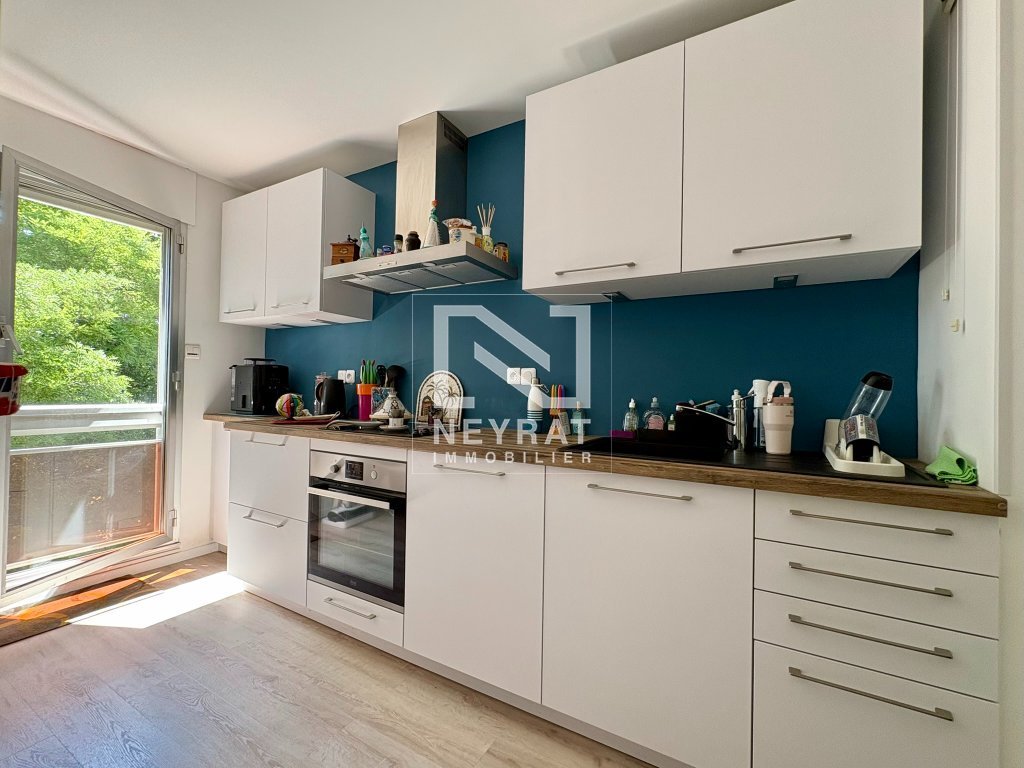 Appartement avec balcon, cave et garage privatif - Environnement verdoyant - Quartier Wilson / Allées du parc